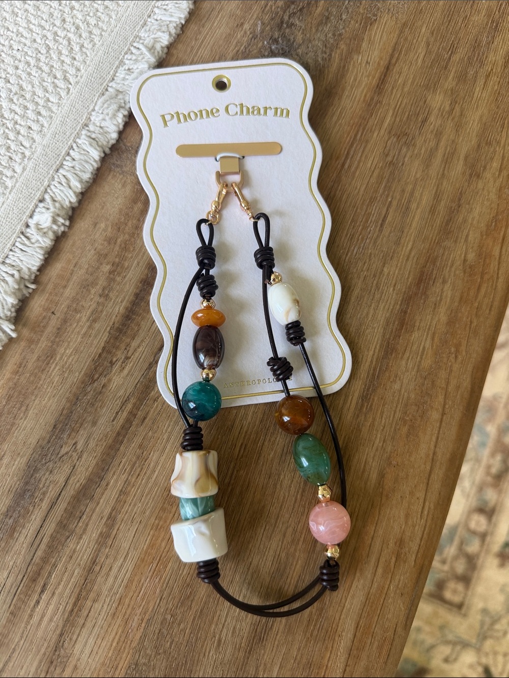 Anthropologie Multicolor Beaded Phone Charm with Gold Accents